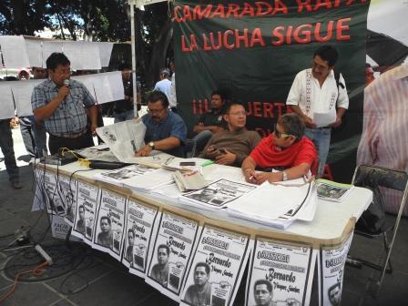 Campaign table with Bernardo Vasquez posters and banner.