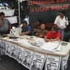 Campaign table with Bernardo Vasquez posters and banner.